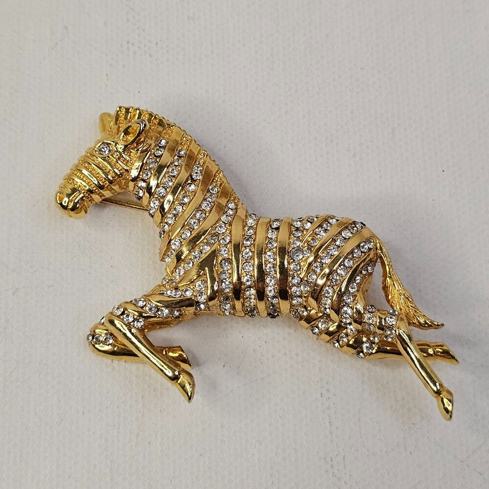 Oleg Cassini 1964 Gold Tone Zebra Horse Brooch Clear Rhinestone Marked Pin VTG